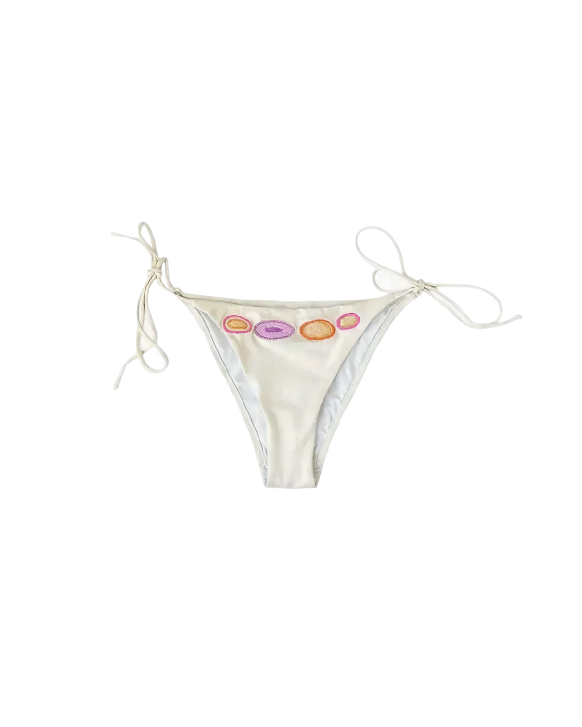 White bikini bottom with colourful embroidered dots on a white background