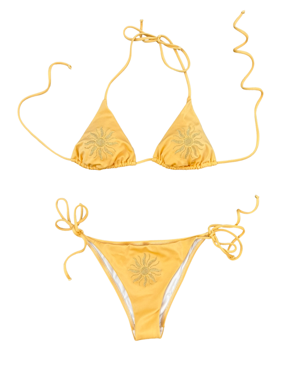 A two-piece yellow string bikini set with a sun motif on each cup and the front of the bottom, displayed flat against a white background.